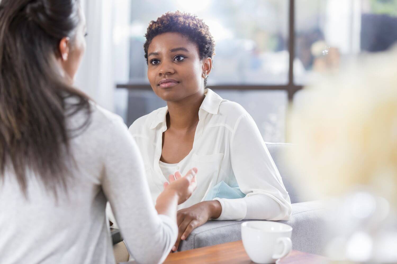 Women in conversation during a counseling session