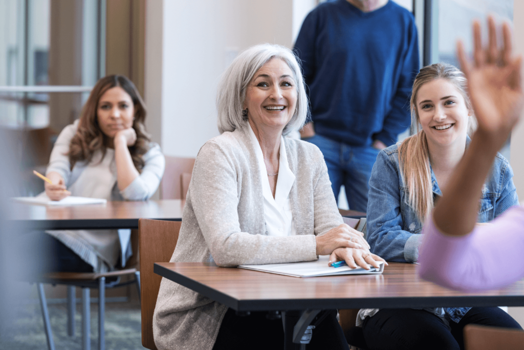 Women sitting at desks during a parenting class