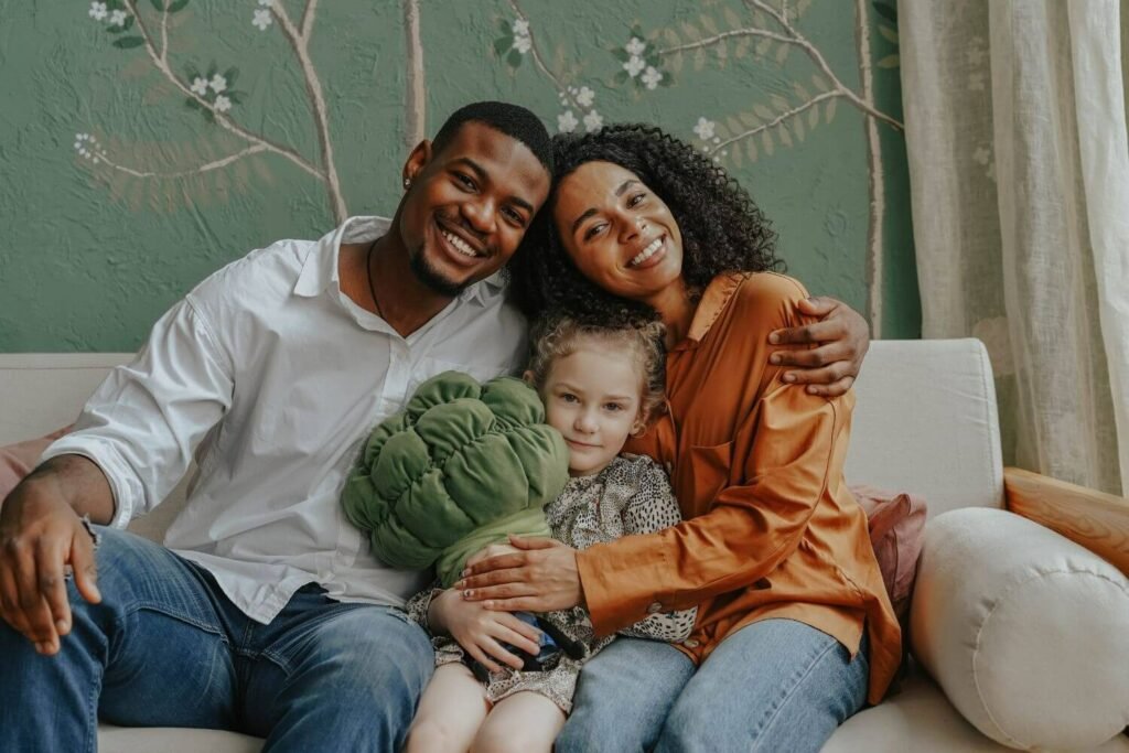 Family embracing their adopted child