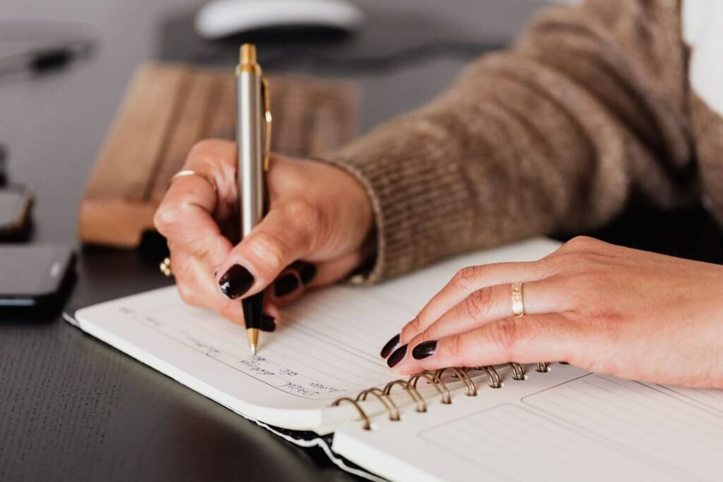 Woman writing a birth plan