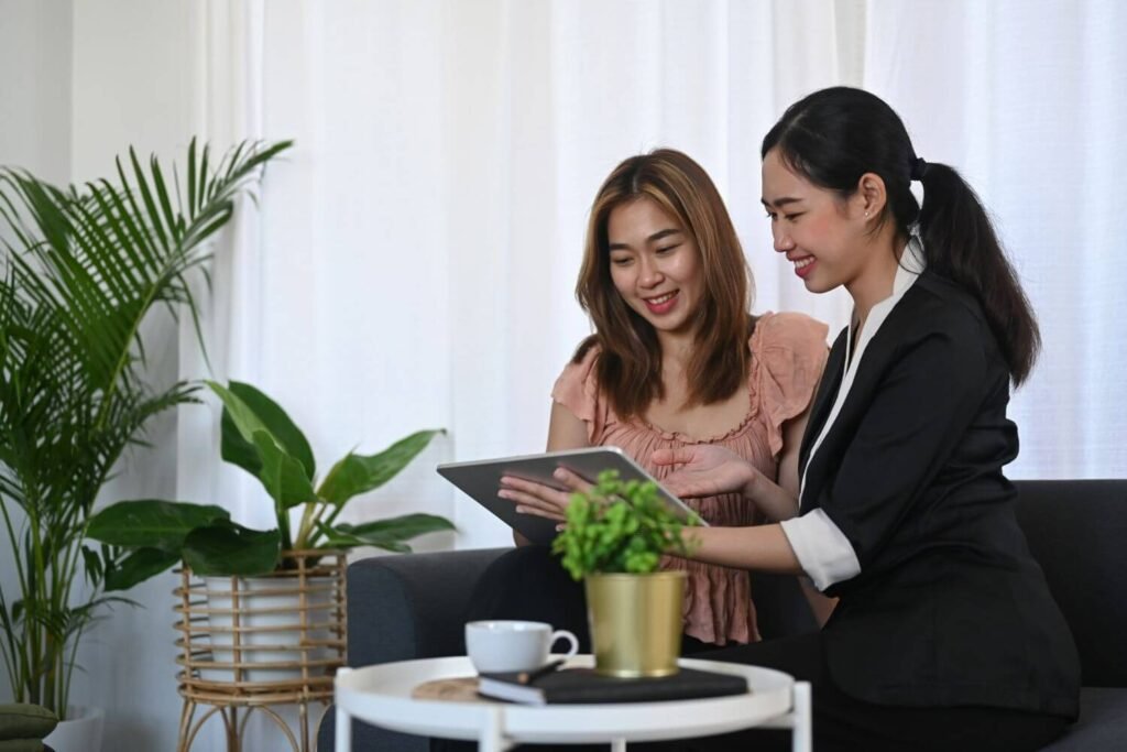 Woman discussing insurance policies with another woman