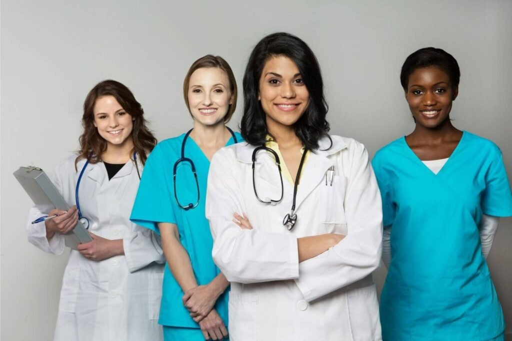Pregnancy help center physician and staff with smiling, welcoming faces
