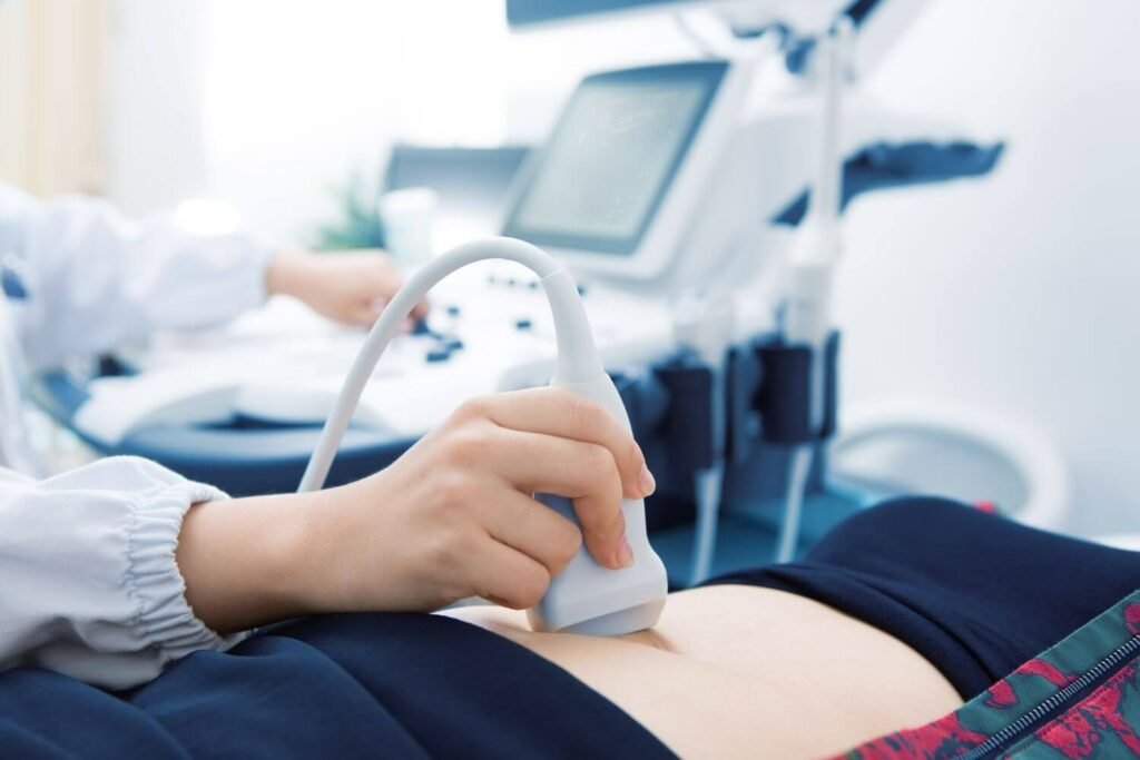 Woman undergoing a confirmatory pregnancy ultrasound at a pregnancy help center